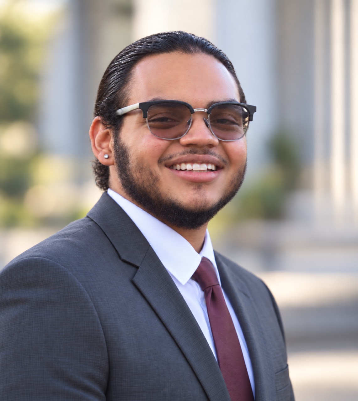 William Martinez in a suit and tie